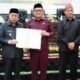 Wali Kota Gorontalo Adhan Dambea saat menghadiri apat Paripurna DPRD Kota Gorontalo dengan agenda pembicaraan tingkat II dalam rangka persetujuan bersama terhadap Rancangan Peraturan Daerah tentang Perubahan APBD Tahun Anggaran 2026 di Aula DPRD Kota Gorontalo, Senin, 21 September 2026. (Foto: Humas)