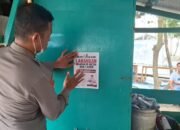 Sat Binmas Polresta Samarinda memasang Maklumat Kapolda Kaltim di sejumlah titik untuk mengajak masyarakat mencegah kebakaran hutan dan lahan/Hibata.id