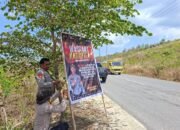 Polsek Mawasangka Tengah memasang baliho di tiga titik strategis untuk mengajak masyarakat Buton Tengah mencegah kebakaran hutan dan lahan saat musim kering/Hibata.id