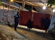 Gudang di Desa Dumbayabulan, Kecamatan Suwawa Timur, Bone Bolango, yang menjadi lokasi penyimpanan material diduga batu hitam dan sempat dipasangi garis polisi/Hibata.id